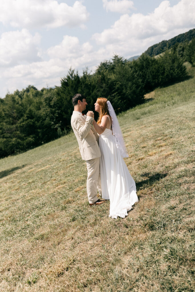 bride and groom holding hands