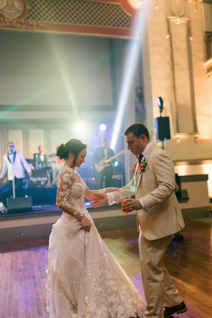 bride and groom dancing