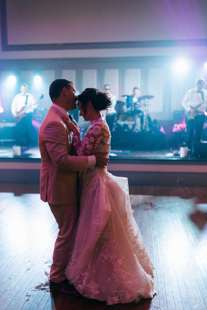 soft and slow dancing with bride and groom