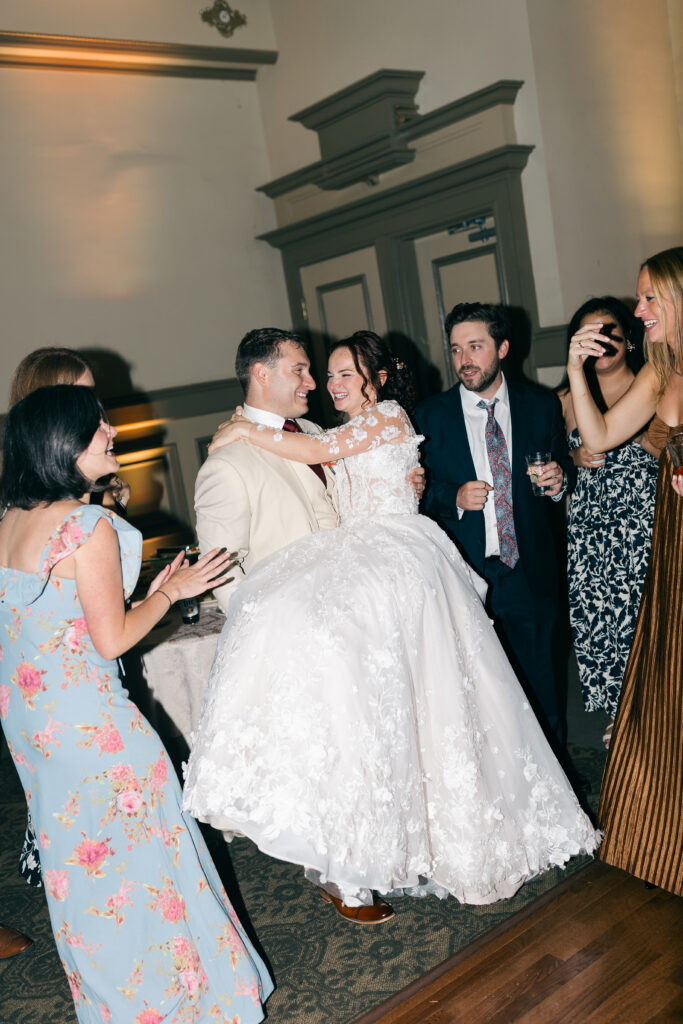 crowd surrounding bride and groom