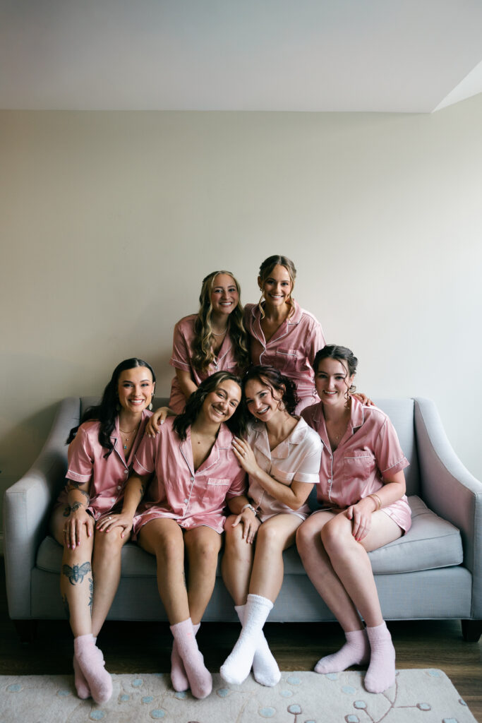 bride and bridesmaids smiling