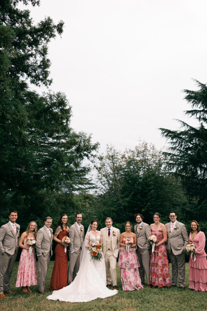 wedding party standing and smiling