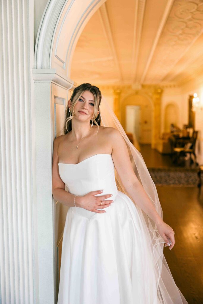 bride playing with veil